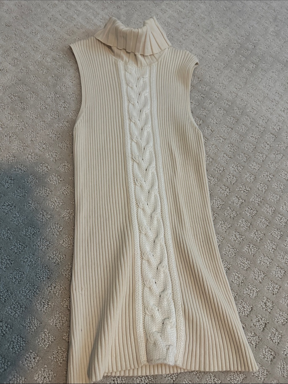 Sleeveless Cable-Knit Turtleneck Sweater in Cream